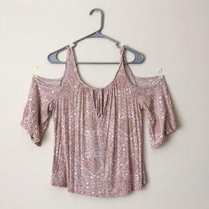 Loose fitting off the shoulder shirt